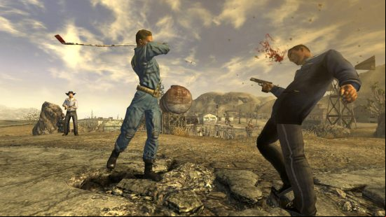 Best Fallout New Vegas mods: one guy slugging another guy with a gun in a face with a bat in the desert. A third man is holding a shotgun.