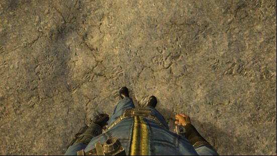 A Vault dweller staring at their own feet in the enhanced camera Fallout New Vegas mods.