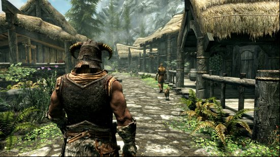 Skyrim: a muscly warrior wearing a horned helmet walks through a medievil down