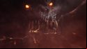 The rageful face of a Bloodthirster, a Greater Daemon of Khorne, stares back at Tsarina Katarin of Kislev through a cracked mirror in Total War: Warhammer 3