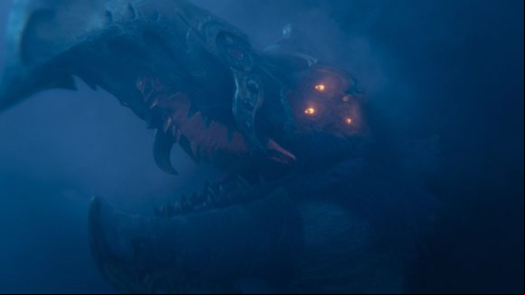 A close look at the multiple blinking eyes of a Lord of Change, a Greater Daemon of Tzeentch, in Total War: Warhammer 3