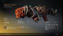 A gun with chunky orange flesh, rags, and bones