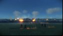 A siege in rome total war, siege weapons firing at a city walls in the distance