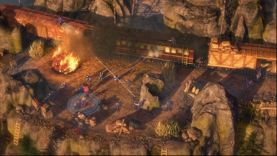 A man on a train shoots down at some bandits in western game Desperados III