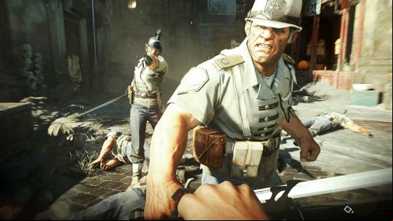 Two city guards weilding flintlock pistols attack the player