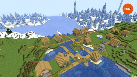 A plains village overlooking an ice spikes biomes in one of the best Minecraft Christmas seeds.