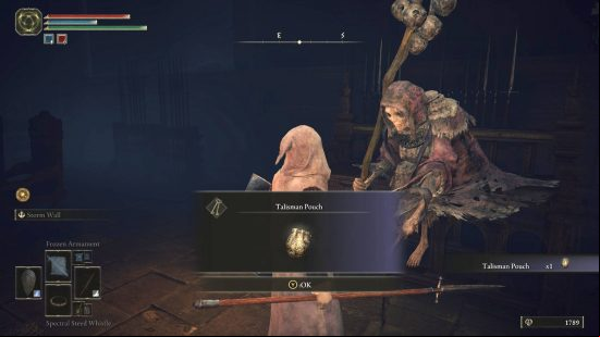 Best Elden Ring talismans - the player is being given a talisman pouch by an old woman.