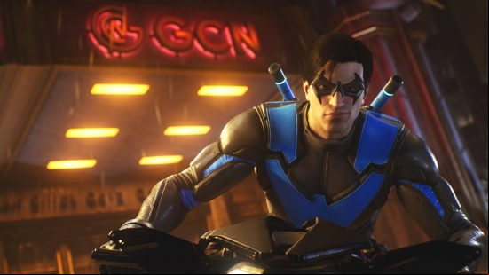 Gotham Knights styles: Nightwing is perched on a motorbike, wearing a blue and black outfit. He is outside the GCN building.