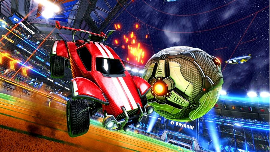 Rocket League - a red car intercepts a large ball in mid-air over a football-style pitch