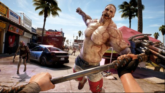 Dead Island 2 release date: A huge body buider zombie flings itself at the player, whose hands can be seen holding a heavy sledgehammer weapon
