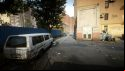 Escape from Tarkov screenshots: On the left, a dingy white van parked next to a blue metal fence leading down an alleyway toward a red brick industrial building, graffiti can be seen on the walls nearby
