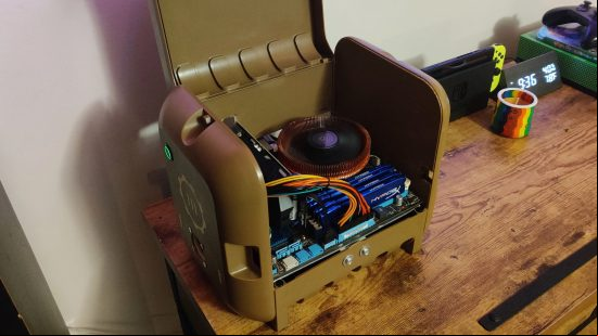 Fallout 4 Pip-Boy gaming PC with the case open, showing the RAM, U cooler, and other components