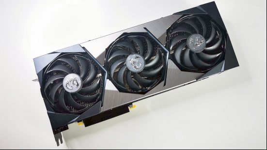 MSI RTX 3090 Suprim X graphics card on white surface