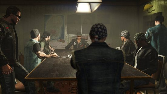 Best Multiplayer games - a group of bikers sat around a table in GTA 5. There are heist plans taped to the wall behind the biker wearing a jacket with skull and crossbones on it.