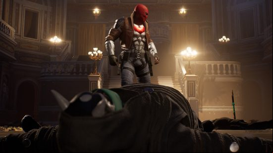 Gotham Knights - Red Hood stands over an knocked-out enemy