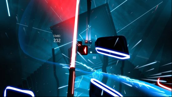 Best VR games - slicing a cube in two in Beat Saber. Blue boxes are cut with the blue sword while the red ones are sliced are red.
