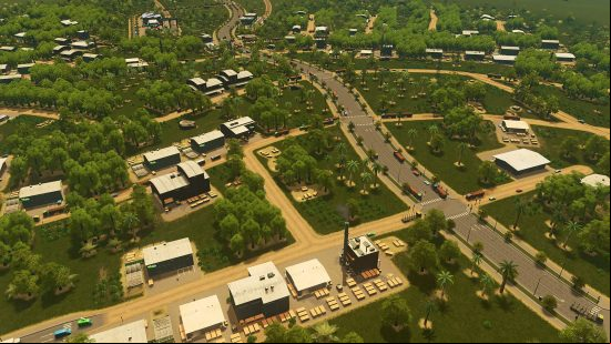 Games like Sims: An overhead view of a sprawling city, with plenty of green spaces offset by industrial factories.