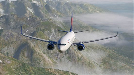 A large, white enger plane flies above lush mountains in X Plane 11, one of the best flying and plane games.