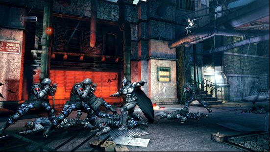 Best Batman games - Batman fighting armed goons while Catwoman perches on top of a pipe in Arkham Origins Blackgate.
