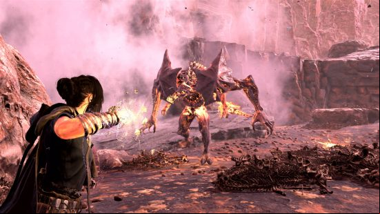 Forspoken builds - Frey is about to fire a shot of magic at an oncoming enemy with hulking muscles and big claws.