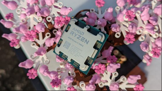The AMD Ryzen 5 7600X processor, atop a Lego bonsai tree