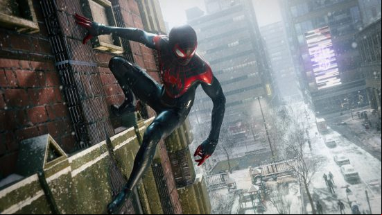Best PC games - Marvel's Spider-Man: Miles Morales: Miles hanging from the side of a building in the snow