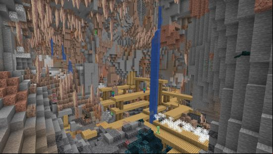 Large Minecraft dripstone caves interlock with a mineshaft and deep dark.