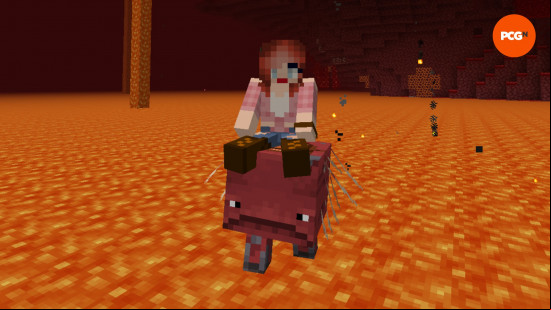 A player with red hair rides a strider using a Minecraft saddle.