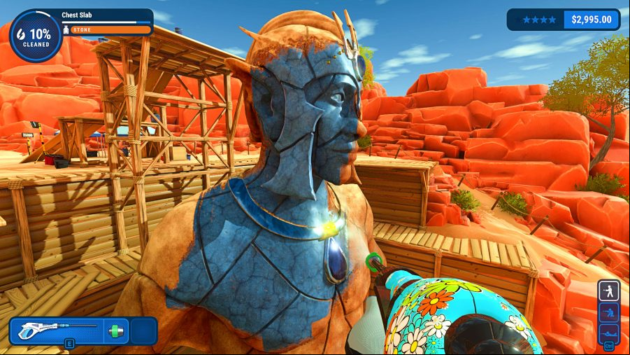 PowerWash Siulator - first-person view of someone washing a giant statue