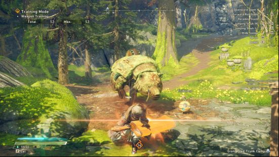 Wild Hearts weapons - a hunter is charging up the Nodachi to unleash a powerful attack on the training dummy. It's a wooden bear.