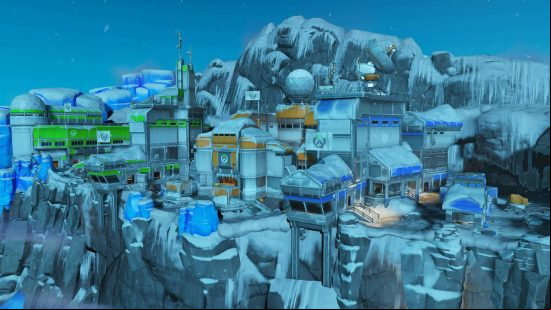 A huge Antarctic research facility with mountains behind it