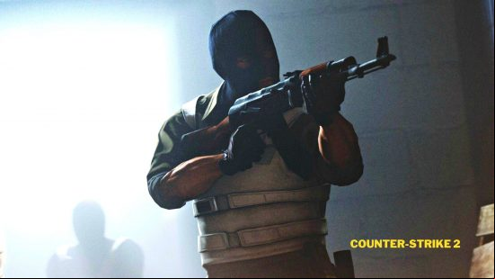 A masked man with only eyes showing readies a rifle wearing body armour