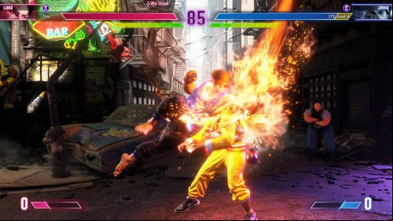 Street Fighter 6 Luke in the middle of performing a charged aerial knuckle on Jamie.