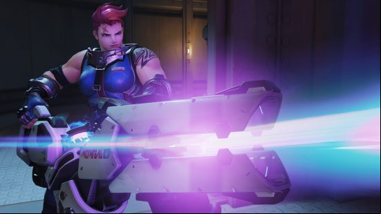 Overwatch 2 characters: a muscular woman with pink hair holds a gigantic energy weapon.
