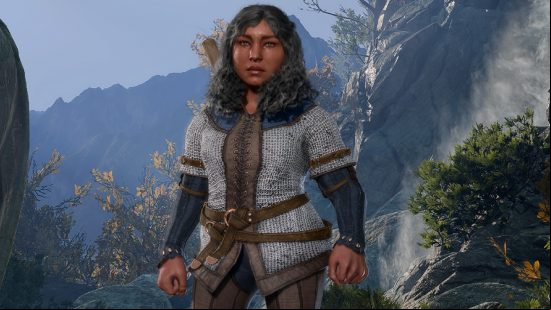 Baldur's Gate 3 Dwarf: a stout female wearing chainmail stands in a forest.