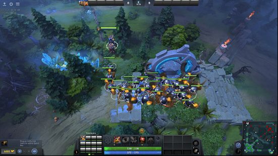 Dota 2 - a group of controllable Sticky Bombs stand around one of the MOBA's Twin Gates.