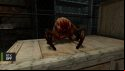 A screenshot from Half-Life 2, in which a headcrab sits atop a cardboard box