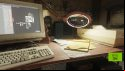 A screenshot from Half-Life 2 RTX, spotlighting a computer (left) and magnifying glass (right)