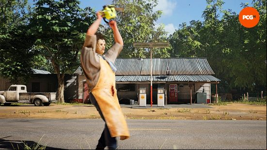 Texas Chain Saw Massacre game review: Leatherface holds his chainsaw above his head in anger, as he stands in front of the gas station, a off-white Chevy truck parked outside. 