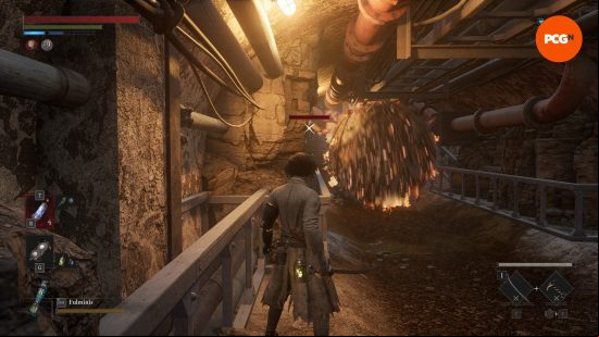 A young boy stands in an underground area as a boulder flies past him