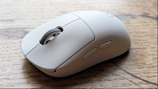 Logitech G Pro X Superlight 2 gaming mouse review: a white Logitech mouse is viewed from side on on a wooden surface.