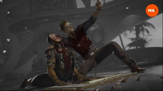A man wearing a black combat shirt and tros poses taking a selfie with a dead character with no face