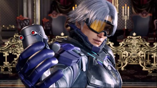 Lee Chaolan, one of the more recently confirmed characters in the Tekken 8 roster, is holding a grenade in the shape of Combot's head.