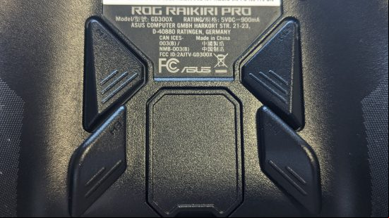 Asus ROG Raikiri Pro review: the back buttons of a black controller are displayed close up.