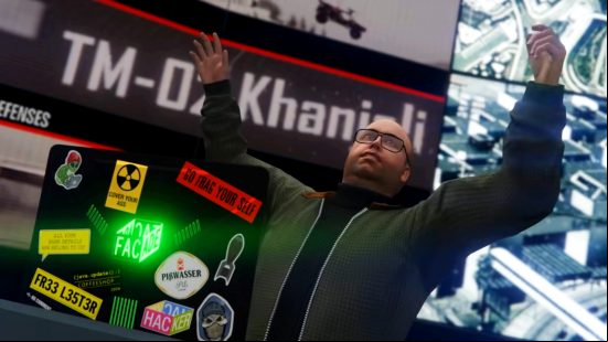 GTA Online The Doomsday Heist - Hacker Lester throws his hands up in the air.