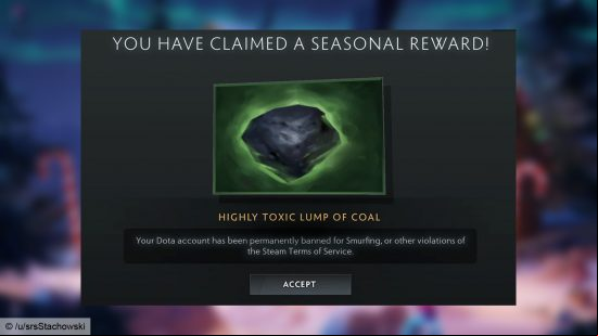 An image of a lump of coal along with a warning as to why a player's been banned. 