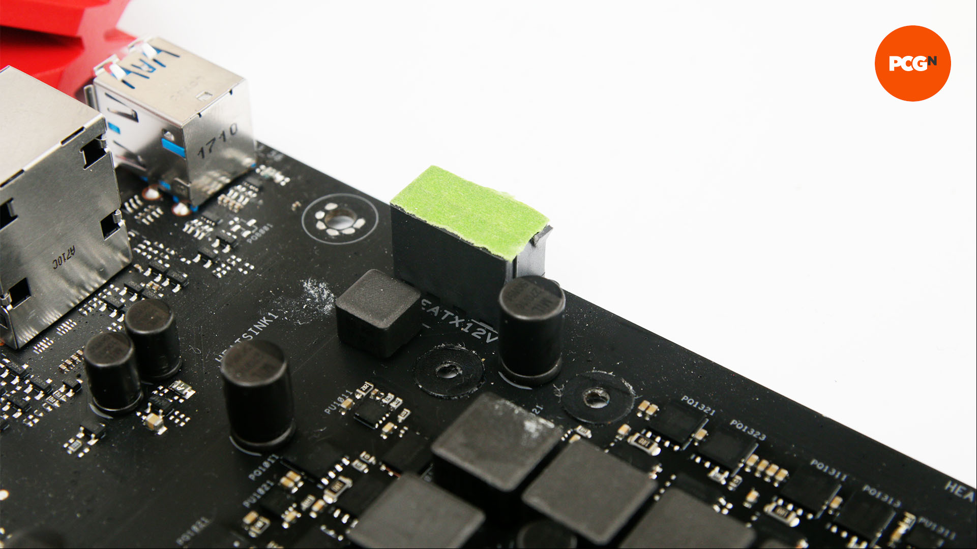 The powersocket of the motherboard is taped up so the board can be painted