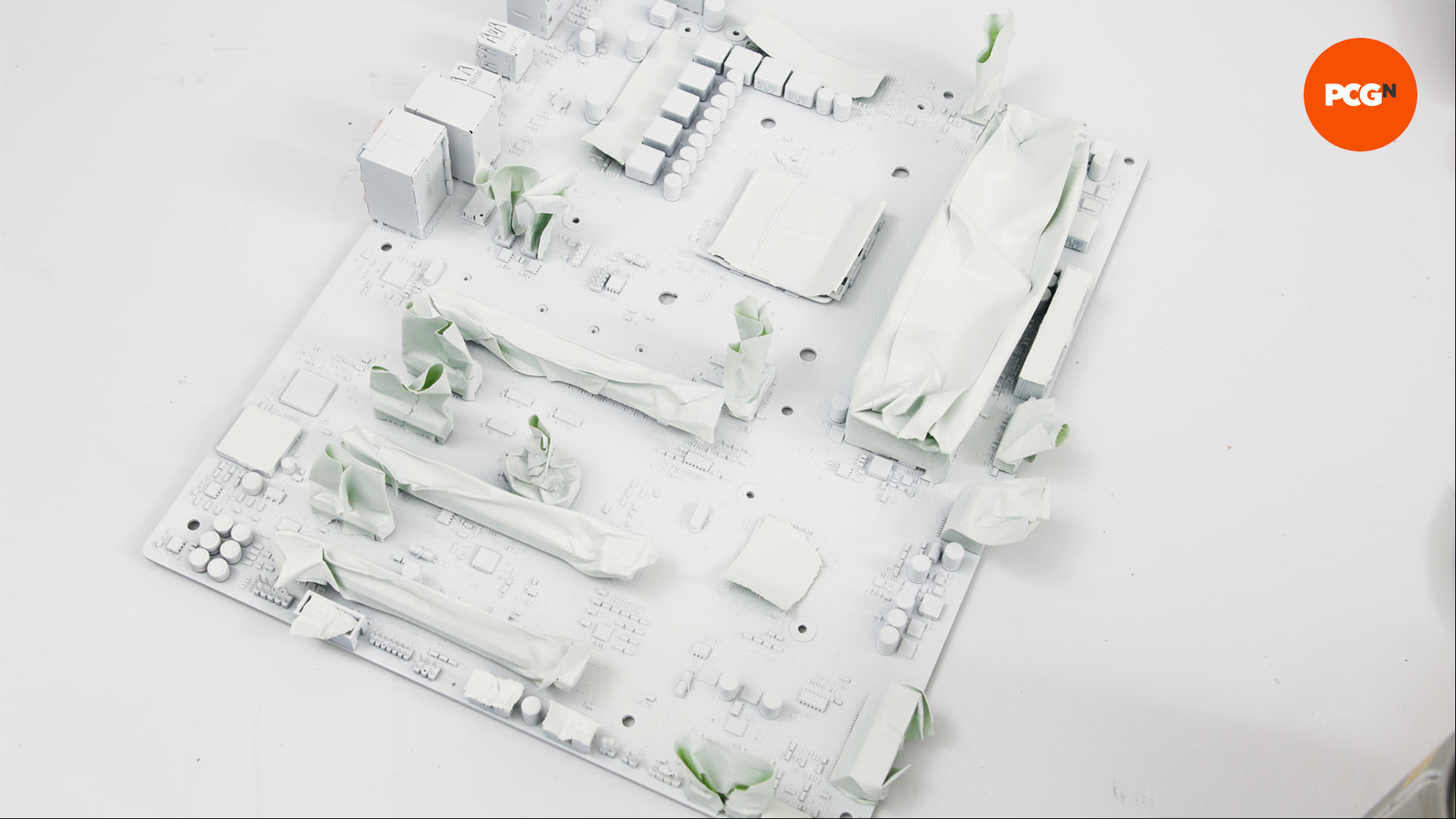 The motherboard is sprayed with white paint