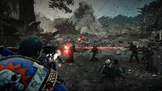 Space Marine 2 release date: Tyrius is shooting over the Imperial Guardsmen at a horde of Tyrannids.