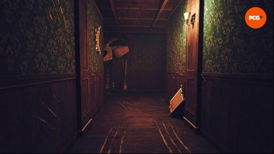 Poppy Playtime review: A dark and dingy corridor, with deep scratch marks across the walls and floors, in Poppy Playtime Chapter 3.